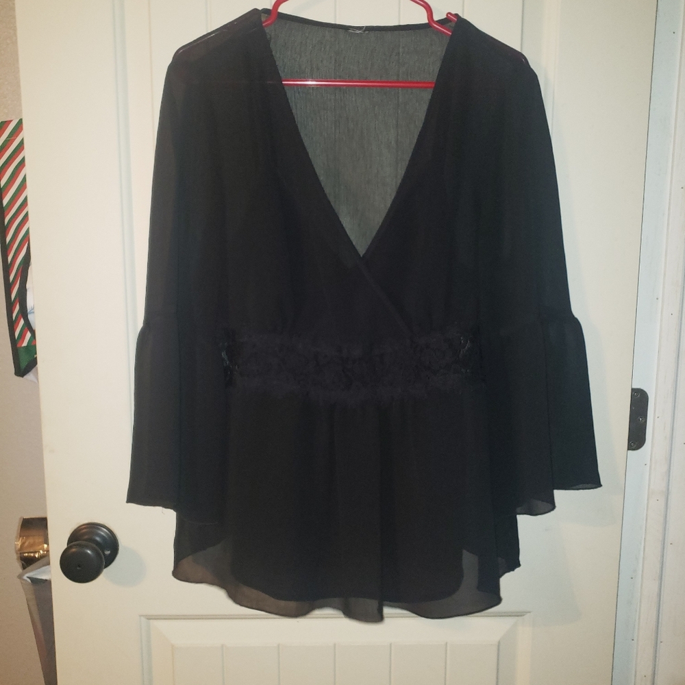 Sheer black 2-piece flared sleeve blouse. Like new.